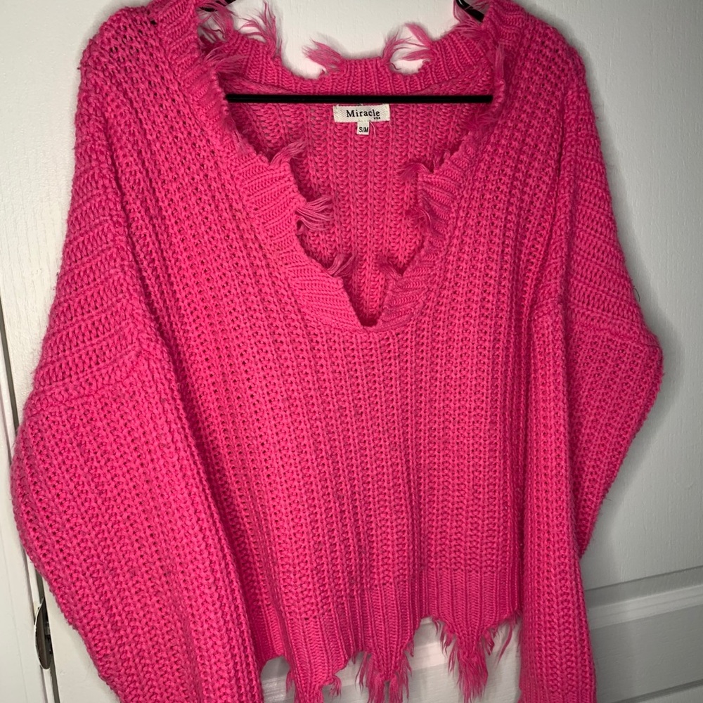Pink distressed sweater